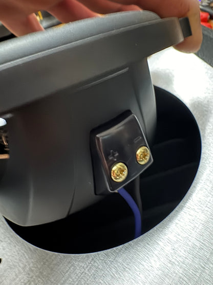 Speaker terminals with gold connectors through the cutout in a BBOR V3 aluminum panel