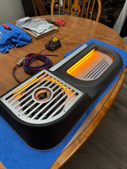 BBOR V3 lighted door speaker panel with orange lighting being wired on a workbench