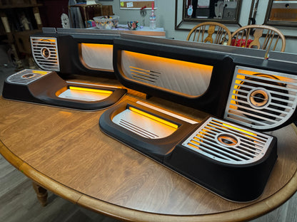 Complete set of BBOR V3 lighted door speaker panels with orange lighting on a table